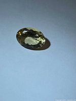 Top view of oval cut yellow Heliodor gemstone