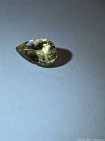 Pear-cut golden Helidor angled view showing colour and facet reflection