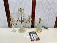 Overall view of candelabra, lamp base, and packaged LED candles on table