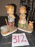 Both Napco praying children figurines side by side