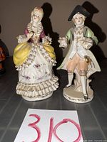 Both Orion porcelain figurines front view