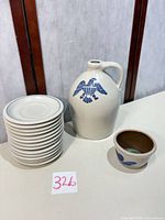 Group view of jug, bowl and stacked saucers