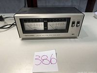 Front view showing meters, switches, model marking