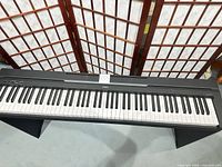 Top view of Yamaha P-71 digital piano on stand