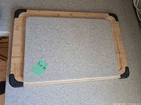 Both cutting boards stacked showing size comparison and surfaces