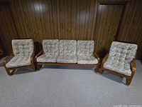 Front view of couch and chairs showing full set and upholstery