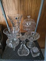 Group shot of all seven clear cut-glass items
