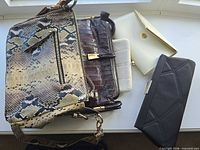 All five bags laid out on windowsill