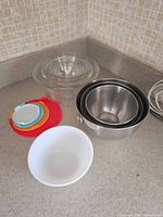 All bowls and lids grouped on countertop