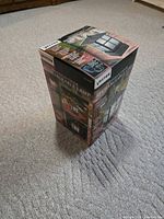 Front and side views of unopened Vector rechargeable lamp box