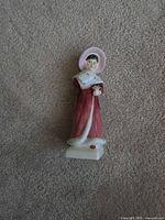 Front view of Royal Doulton Sophie figurine showing colours and pose