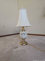 Full view of Quoizel Lenox Tracery table lamp with shade and power cord