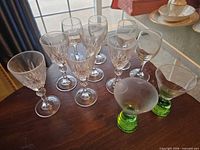 Group shot of all eleven glasses on tabletop