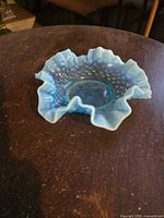 Blue opalescent hobnail ruffled candy dish