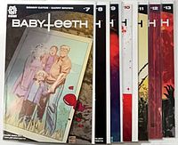 Front covers of issues #7-13 displayed together