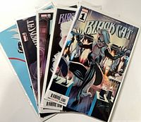 Five Black Cat #1 comics fanned out showing different covers