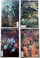 All four bagged foil Dark Nights Metal comics displayed