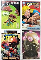 Group shot of four bagged Supergirl comics (#5, #8, #32 main, #32 variant)
