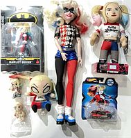 Group shot showing all six Harley Quinn items in lot