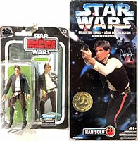 Front view of both Han Solo figures: Black Series carded figure and Kenner Collector Series boxed figure