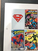 All four bagged comics laid out