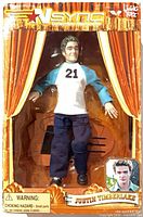 Front view of boxed Justin Timberlake marionette showing figure and window display