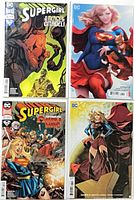 All four Supergirl issues laid out