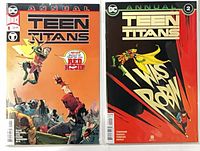 Both bagged Teen Titans Annual comics front covers visible
