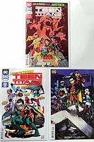 All three bagged and boarded Teen Titans issues displayed: Special #1 top, #20 regular and variant bottom