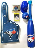 overview of foam finger, mini bat, two helmets, mini ball, boxed card set, card