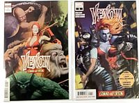 Both Venom Annual #1 issues side-by-side in bags