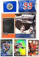 Full lot showing coin, 99 insert, jumbo card, three standard cards