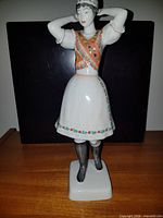 Full view of Hollohaza porcelain woman figurine front