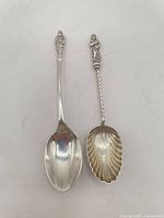 Both apostle spoons full view