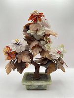 Front view of gemstone bonsai tree in jade base