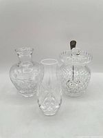 Group image of jam jar with spoon, bud vase and posy vase