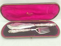 Knife and fork set in open case, full view