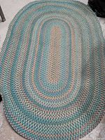 Full view of oval braided rug