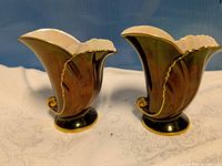 Front view of both vases showing overall design and condition