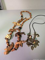 Both necklaces laid out fully