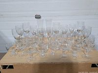 Full assortment of crystal and glass stemware displayed on table