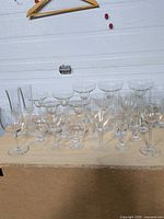 Group shot of all clear stemware pieces on table