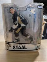 Front view of sealed McFarlane Toys Jordan Staal action figure in clamshell packaging