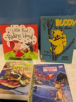 Front covers of all four books displayed together