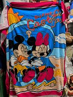 Full view of beach blanket showing graphic and colours