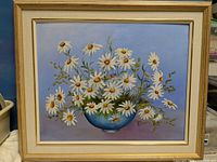 Full view of framed K. Pilgrim daisy painting
