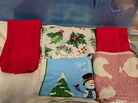 Overall view of tablecloth and four towels folded together