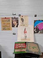 Overall view of seven paper items pinned and laid out