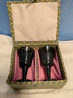 Goblets seated in presentation box, lid open
