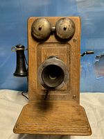 Front view showing bells, transmitter, shelf